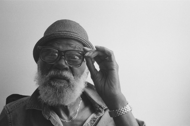 Grandaddy being silly wearing two pairs of glasses. Photo by Jalynn Harris.