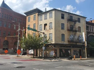 144 (left) and 142 West Fayette Street. Photo by Ed Gunts.