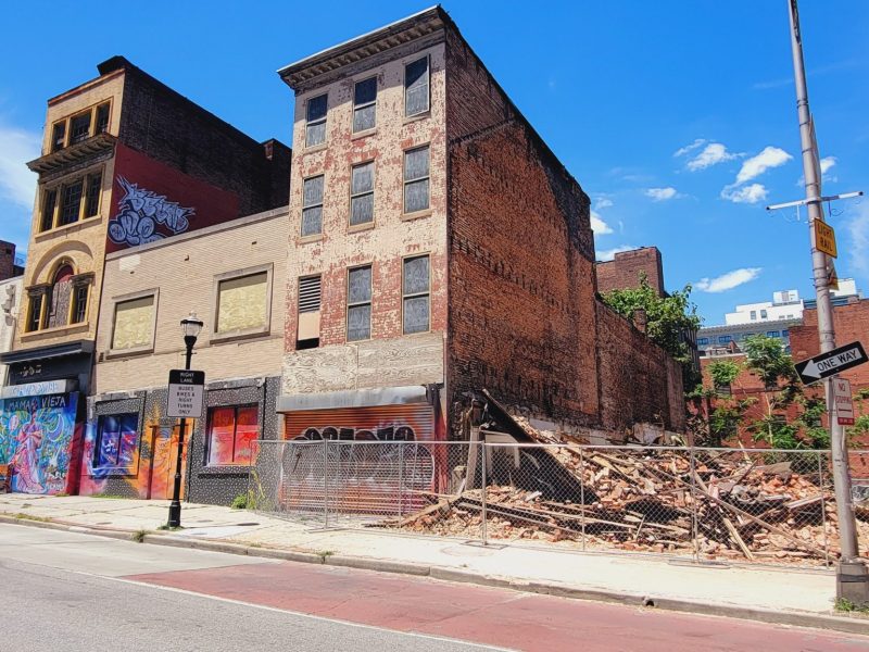 Demolition activity this week on West Fayette Street, where two buildings have been torn down. Photo by Ed Gunts.