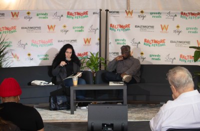 Authors Susan Muaddi Darraj and Rion Amilcar Scott engage in conversation at the Baltimore Book Festival on Sept. 29, 2024. Photo by Maggie Jones.