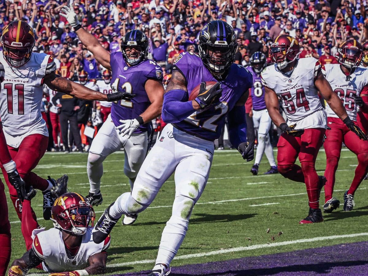 Baltimore Ravens running back Derrick Henry runs the ball in a game against the Washington Commanders. Photo courtesy of Baltimore Ravens.