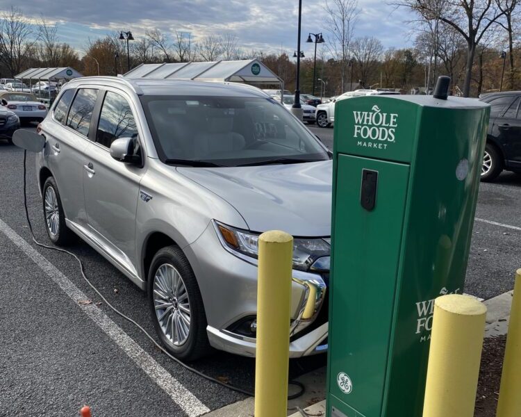 RIVERDALE, Md. - Maryland is using state and federal money to expand the network of electric vehicle charging stations in the state. This is an electric charging station in the parking lot of the Whole Foods Market here. (James R. Carroll/Capital News Service)