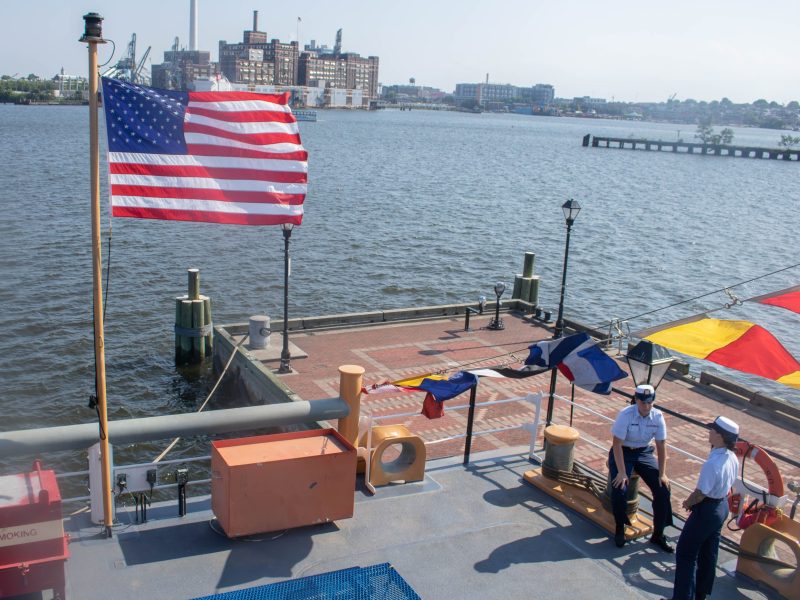 USCG LeAnn Fulton and her crewmate on USCG Cutter JAMES RANKIN on Baltimore's Fells Point Broadway Pier on June 17, 2024. Photo by Maggie Jones.