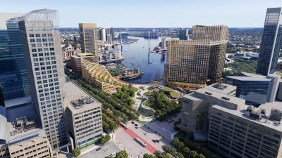 A rendering shows an aerial view of the planned Harborplace redevelopment, including a park at the current McKeldin Plaza. Credit: MCB Real Estate.