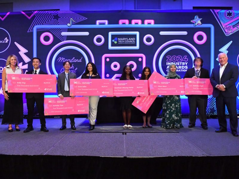 MTC CEO Kelly Schulz (far left) and Alexandria Real Estate Co-COO Larry Diamond (far right) with seven scholarship recipients at 2024 ICON Awards. (Courtesy Maryland Tech Council)