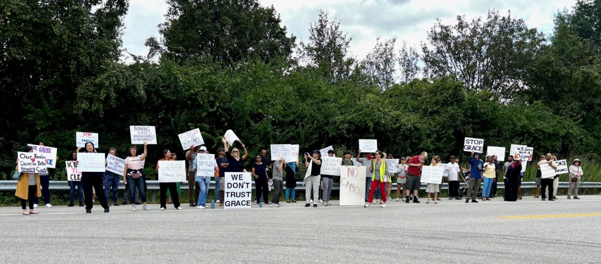 Residents who live near the W.R. Grace headquarters in Columbia gather Sept. 6, 2024 to protest the company's plans for a pilot plastics recycling plant. Members of the Stop the Grace Burning Project group worry the plant could negatively impact local air quality and cause other environmental and health-related harms. Photo courtesy René Maldonado.