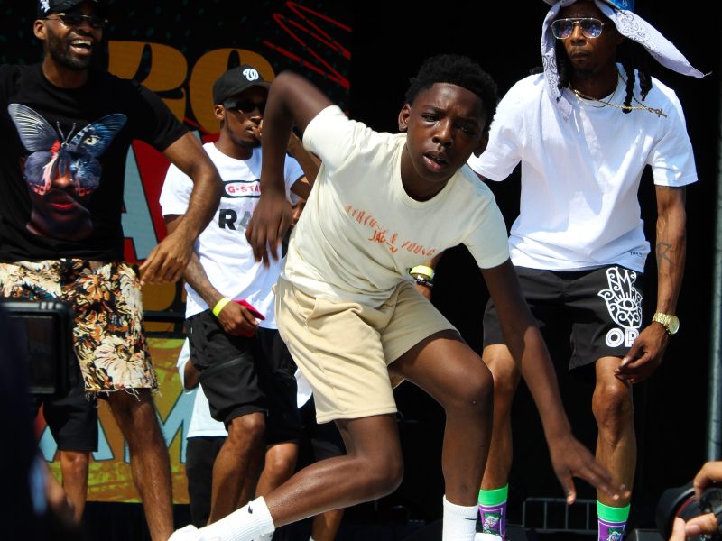 A child dances on stage at the 2024 Baltimore AFRAM festival at Druid Hill Park. Photo by Faith Spicer.