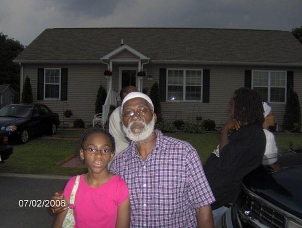 Jalynn and her grandaddy outside an old family home on the Eastern Shore.