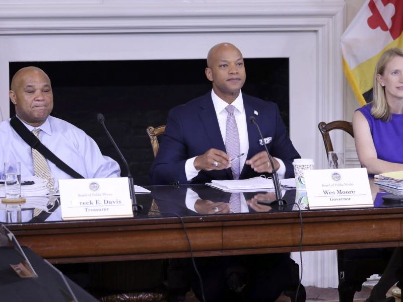 Members of the Maryland Board of Public Works, from left, Treasurer Dereck Davis, Gov. Wes Moore and Comptroller Brooke Lierman listen to testimony about $148.3 million in state budget cuts approved, Wednesday, July 17, 2024 in Annapolis, Md. Photo by Brian Witte/AP.