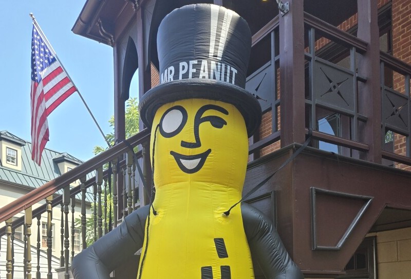 Mr. Peanut greets visitors at the annual gathering of the Peanut Pals Club. The event loosely commemorates the character's "birthday." Photo by Emily Hofstaedter/WYPR.