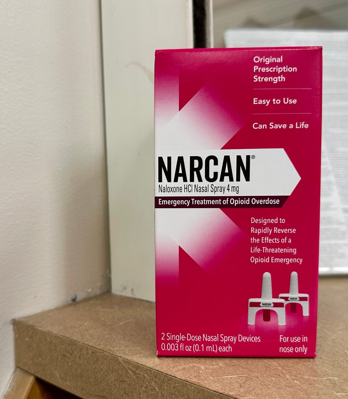 A box of Narcan nasal spray, the opioid-reversing medication that has been approved for over-the-counter use, sits on a pharmacy counter on Feb. 22, 2024. (Sapna Bansil/Capital News Service)