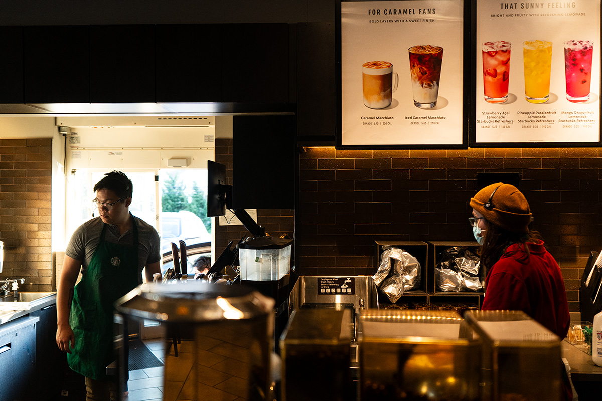 ELLICOTT CITY, Md. - Workers Steve To (left) and Noah Smith (right) at the Shipley’s Grant Starbucks, whose employees just voted to unionize. (Mathew J. Schumer/Capital News Service)