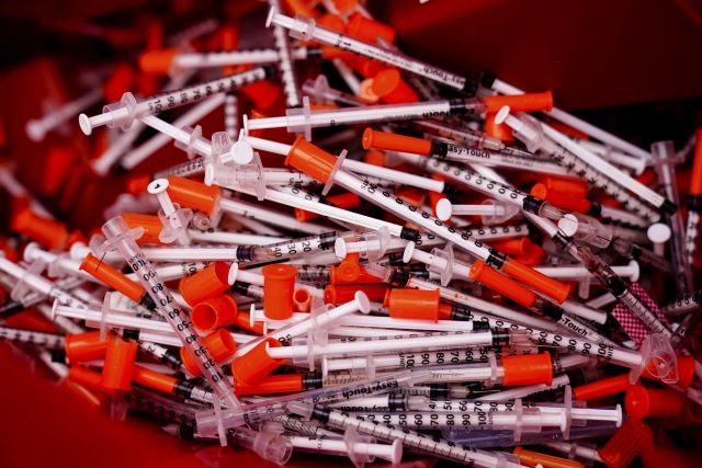 Shown are used syringes collected at a needle exchange run by Camden Area Health Education Center in Camden, N.J., Thursday, Feb. 24, 2022. Photo by Matt Rourke/AP.