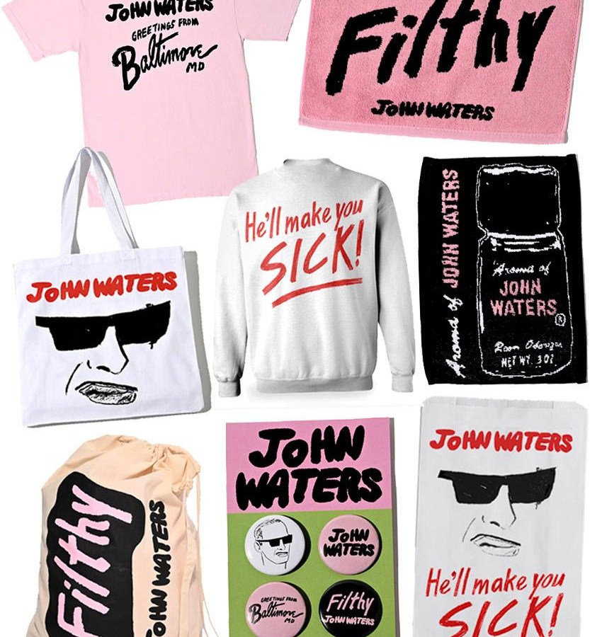 Shirts, bags, and other items display quotes from some of John Waters's movies and illustrations of the filmmaker himself in sunglasses.