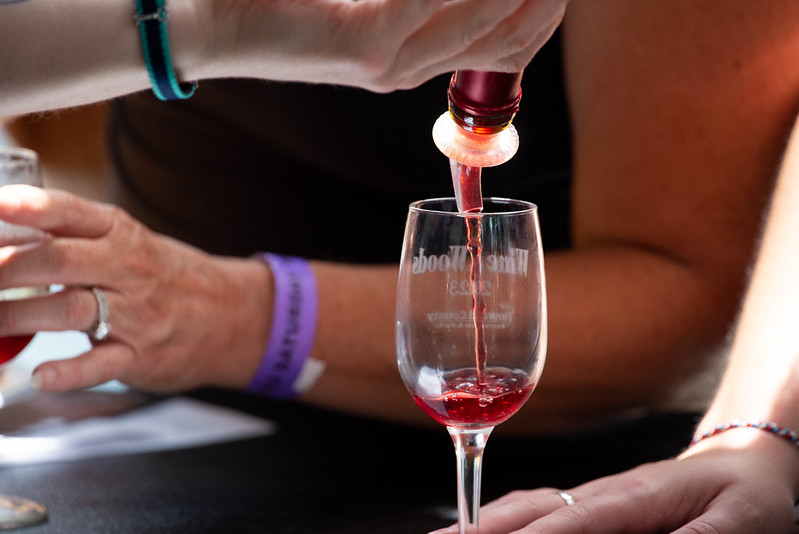 Wine is poured into a glass at a previous year's Wine in the Woods event in Howard County. Photo courtesy of Howard County Department of Recreation & Parks.