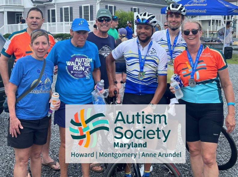 group of seven adults in bike gear and helmets smiling for camera with Autism Society of Maryland logo at the bottom of the photo